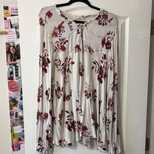 Eyeshadow Cream and Red Floral Blouse